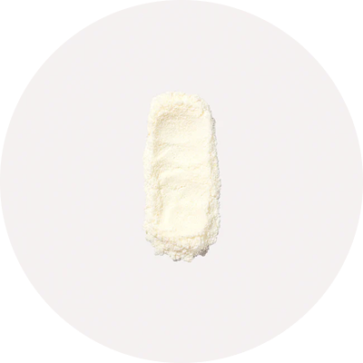 A fluffy, cream-colored slipper sock on a plain white background.