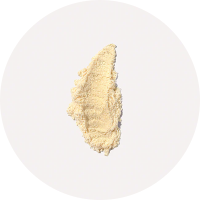 A smear of beige powder on a white background.