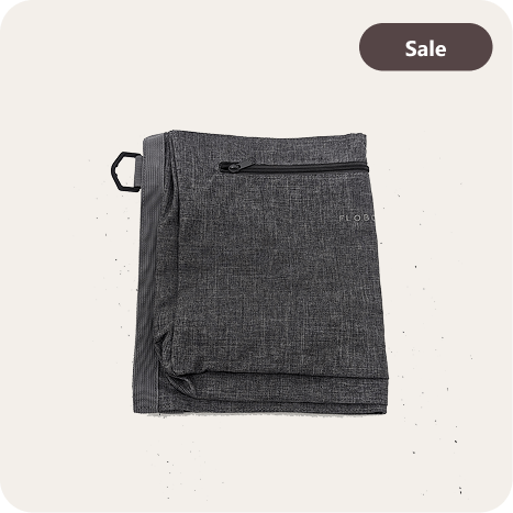 Folded gray fabric with a zipper pocket, labeled 'Sale'.