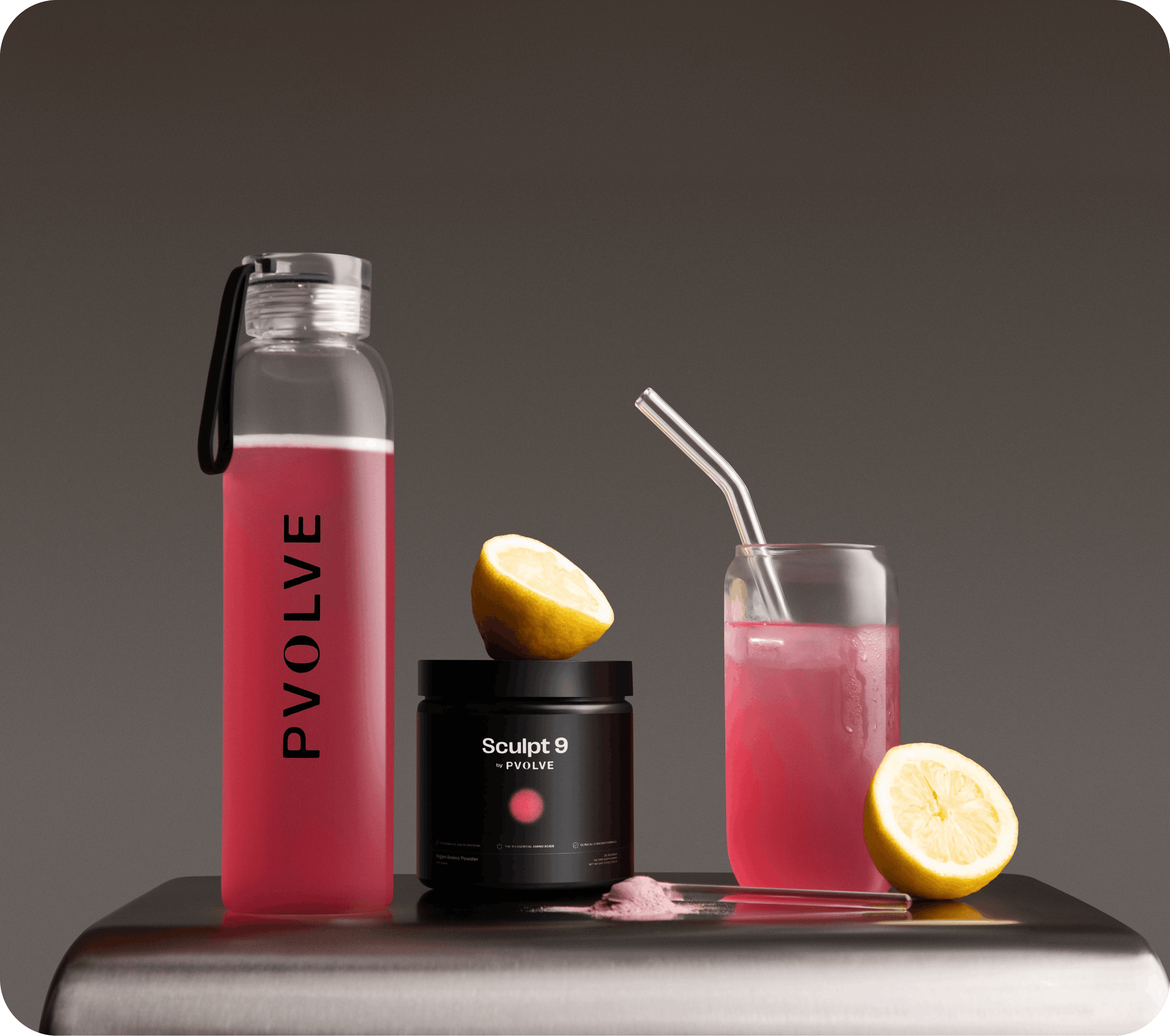 Pvolve Sculpt 9 powder, a water bottle, and a glass of pink drink with lemons.