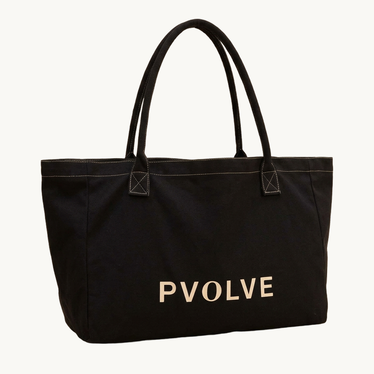 A black canvas tote bag with 'PVOLVE' printed in light-colored text on the front.