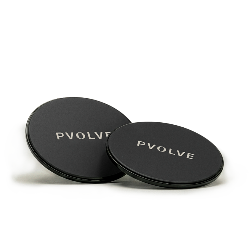 Two black, circular Pvolve discs on a white background.