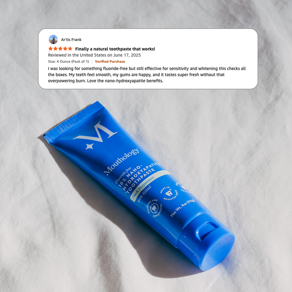 Blue toothpaste tube on white fabric with a customer review overlay.