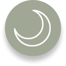 A white outline of a crescent moon inside a sage green circle.