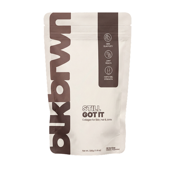 A white and brown pouch of Bukdwn's Still Got It collagen supplement for skin, hair, and joints.