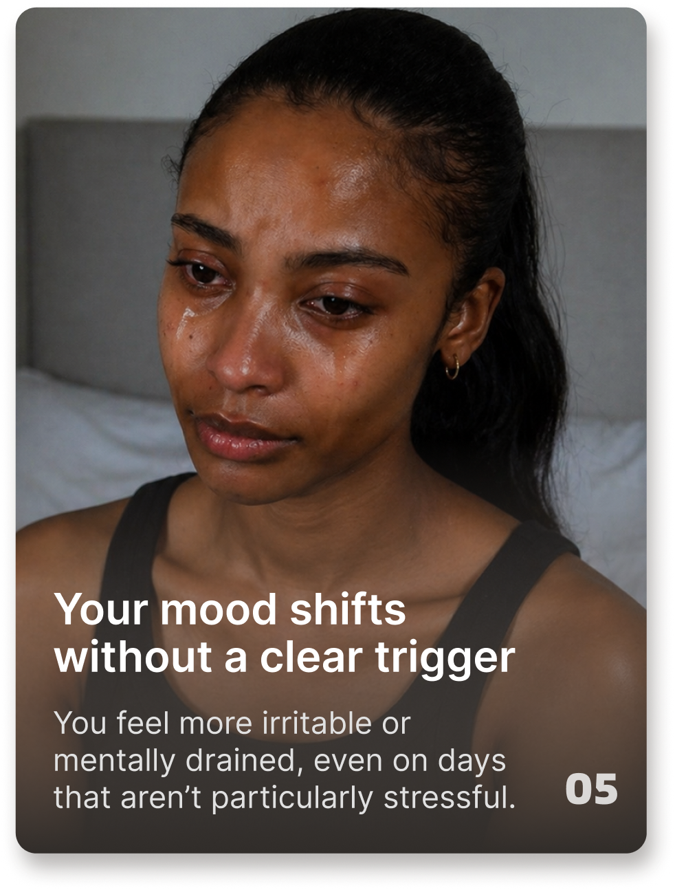 A person crying, with overlay text that reads 'Your mood shifts without a clear trigger'.
