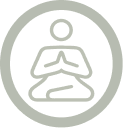 An icon of a person in a meditative yoga pose inside a circle.
