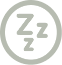 A gray circular icon with three Z's inside, representing sleep.