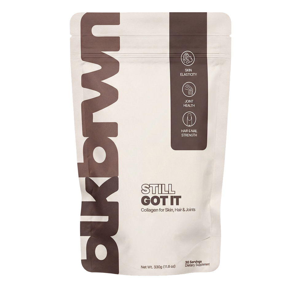 A white and brown pouch of Aukmdwn 'Still Got It' collagen supplement for skin, hair, and joints.