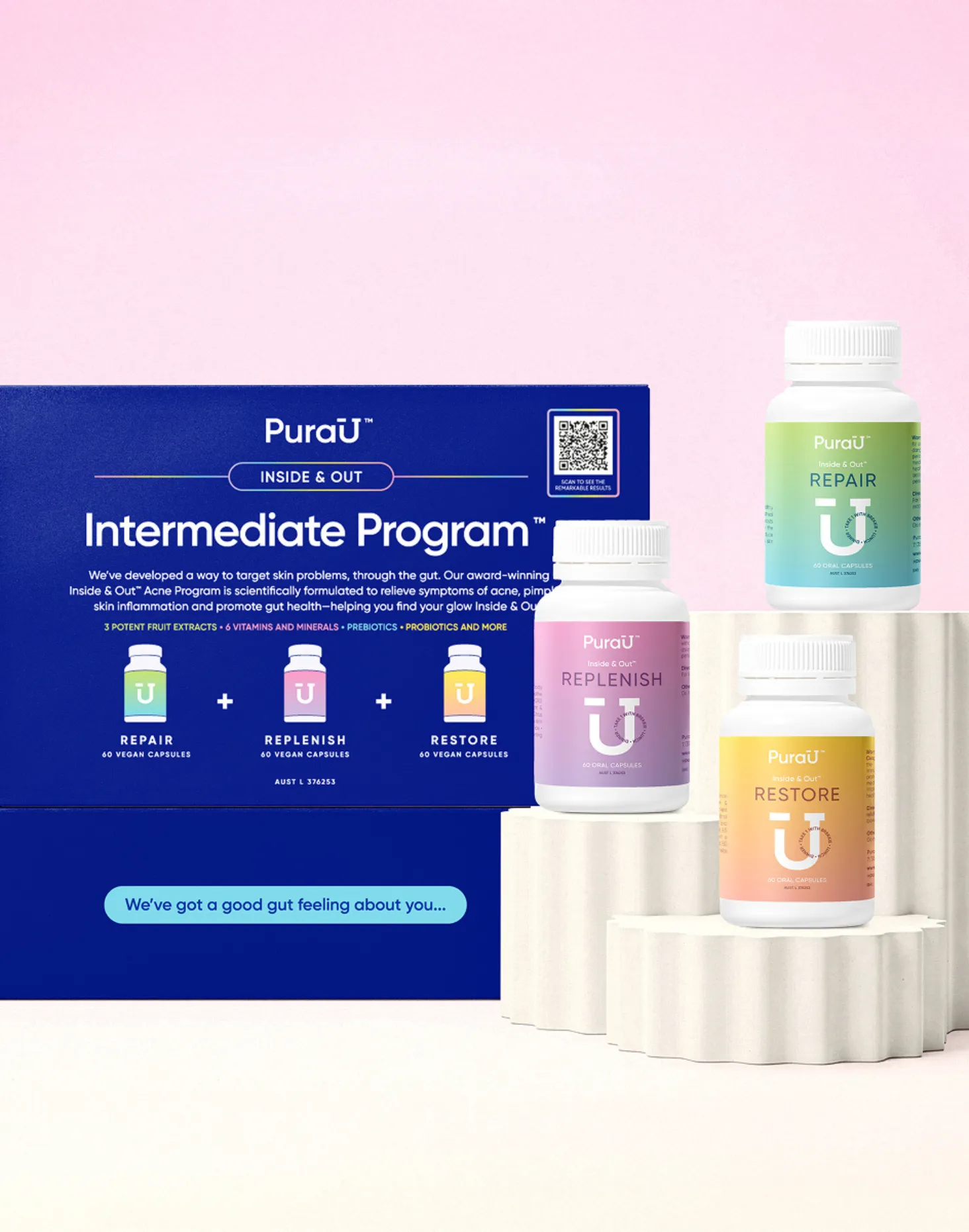 PuraU Intermediate Program product image with three bottles: Repair, Replenish, Restore. Displayed on white stands against a soft pink background.
