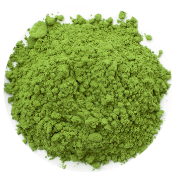 A pile of green powder on a white background.