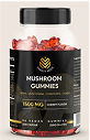 A bottle of mushroom gummies with a black label and red gummies inside.