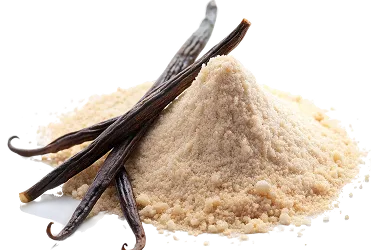 Vanilla beans and a pile of vanilla powder on a white background.