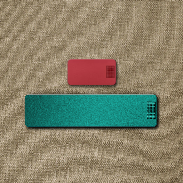 Red and teal textured rectangles on a burlap background.