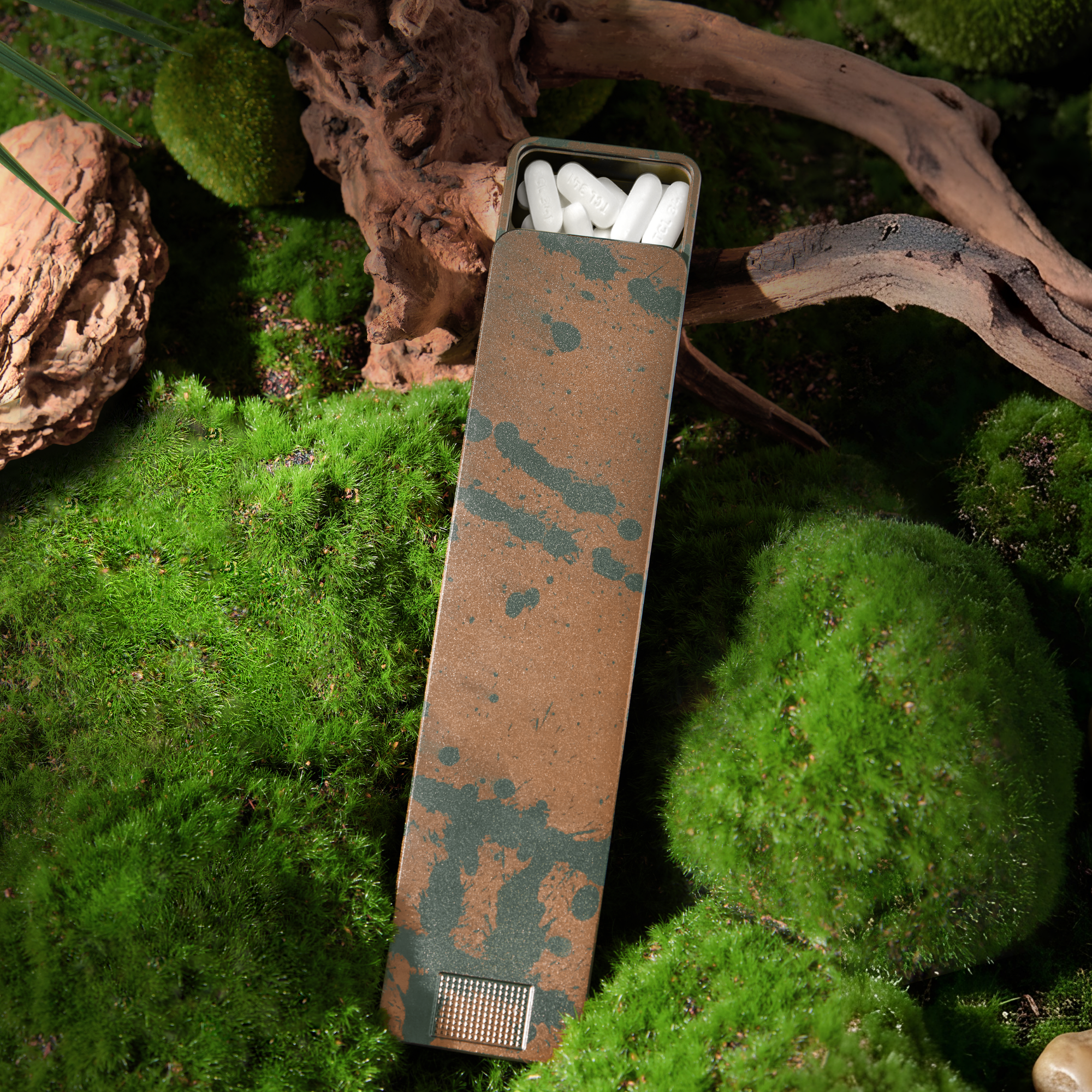 An open, rustic-looking metal tin filled with white oblong pills rests on a bed of green moss.