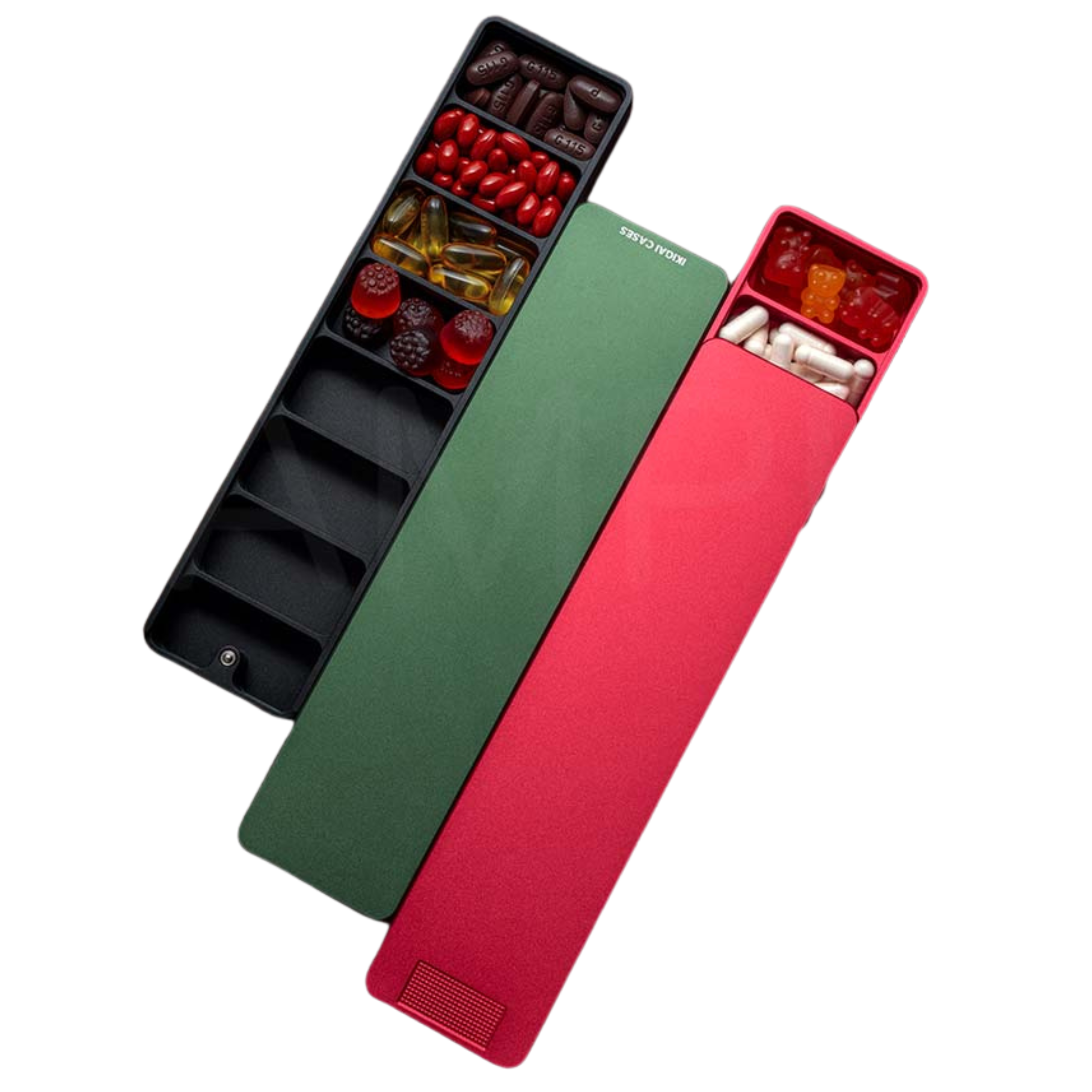 Two colorful pill organizers filled with assorted vitamins and candies.