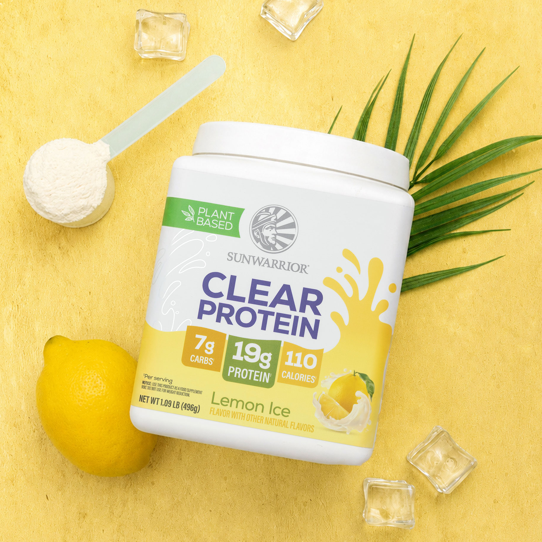 A tub of Sunwarrior Lemon Ice protein powder with a lemon, scoop, and ice on a yellow background.