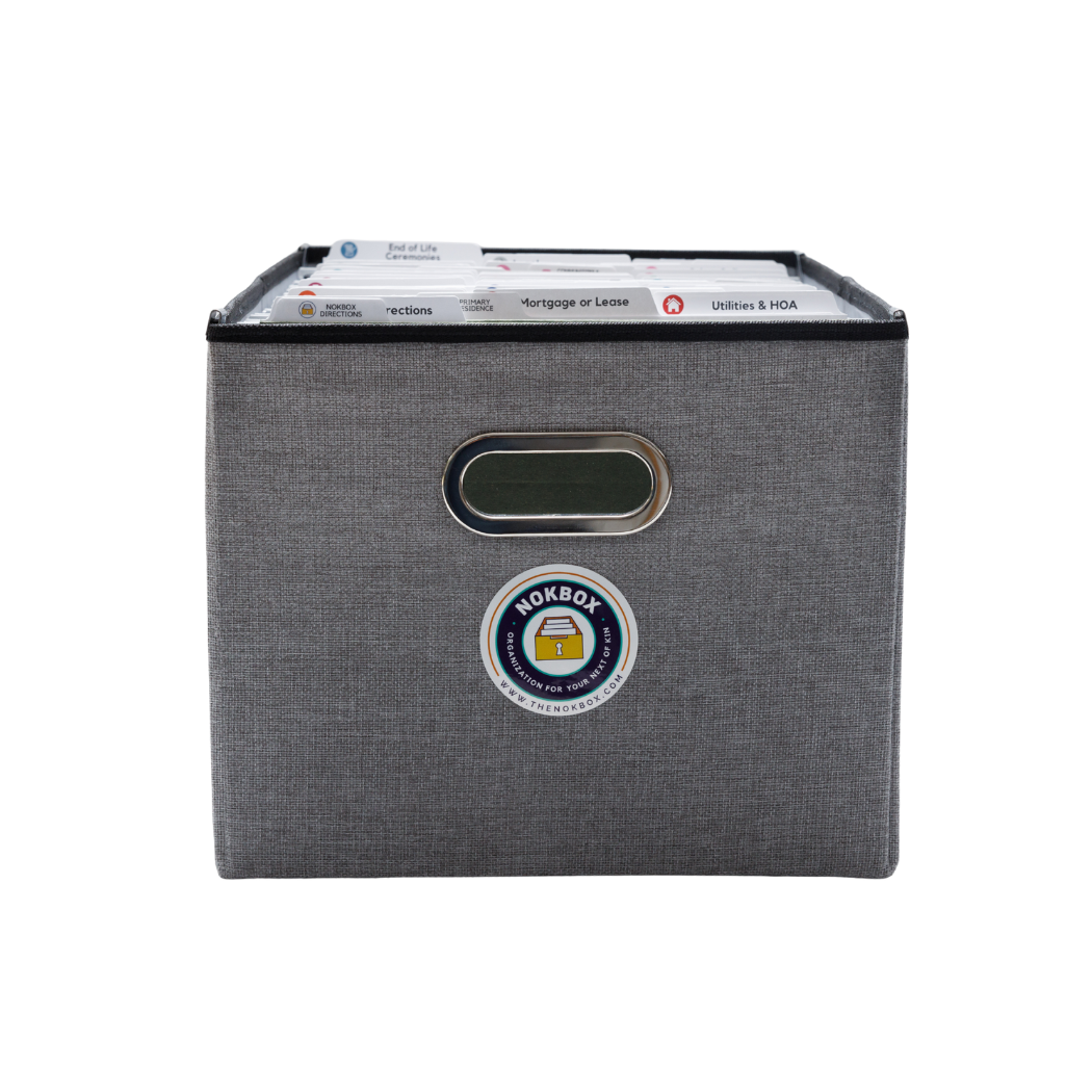 Gray storage box with a label and visible file tabs inside.