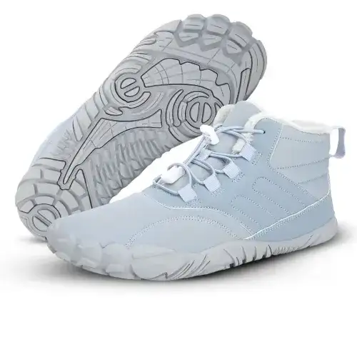 Light blue high-top shoes with textured soles, one upright and one lying on its side.