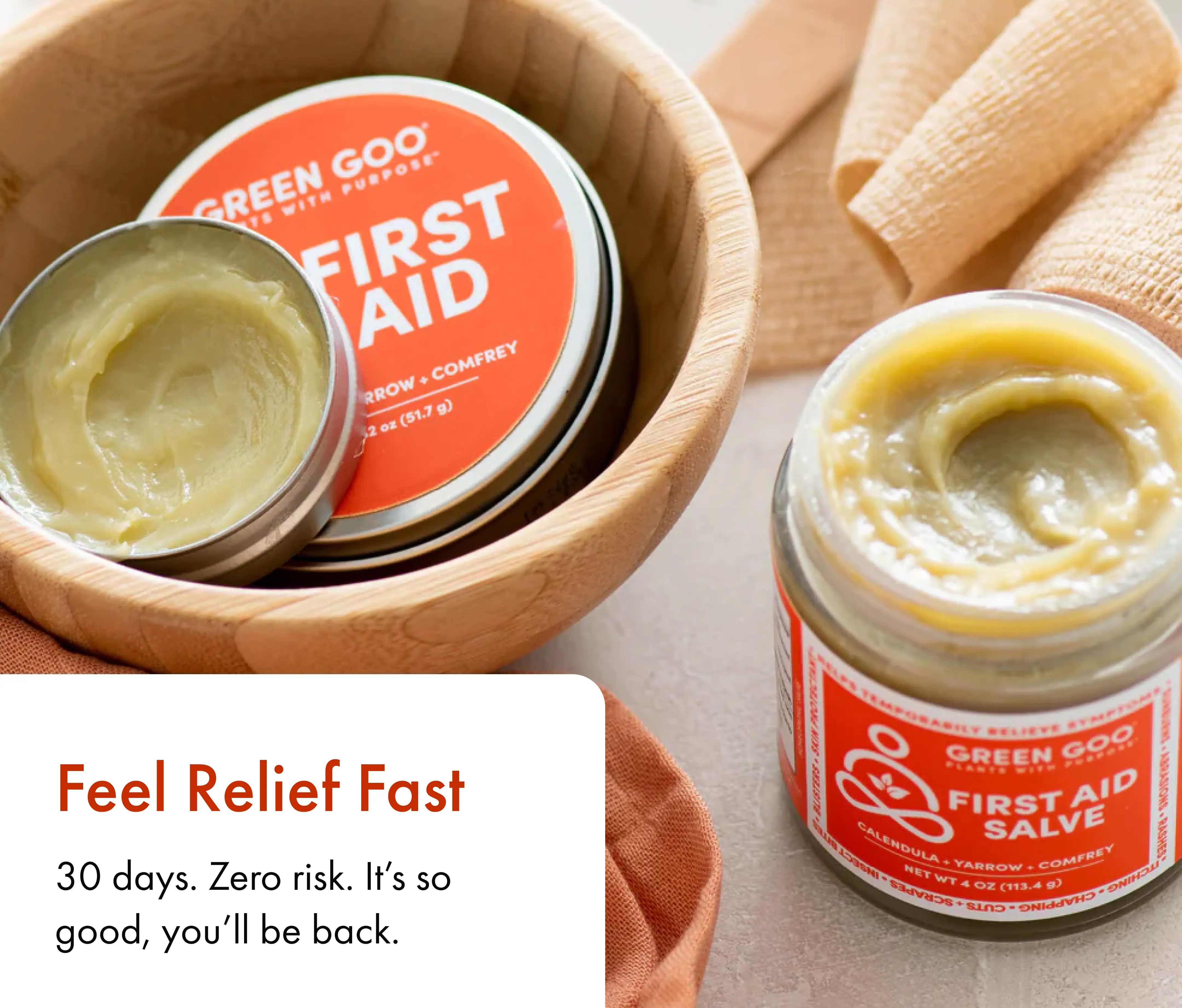 First aid salve in a jar and tin, with wooden bowl and fabric.