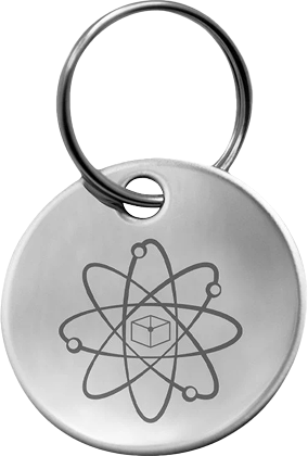 Silver keychain with an atomic symbol engraved on it.