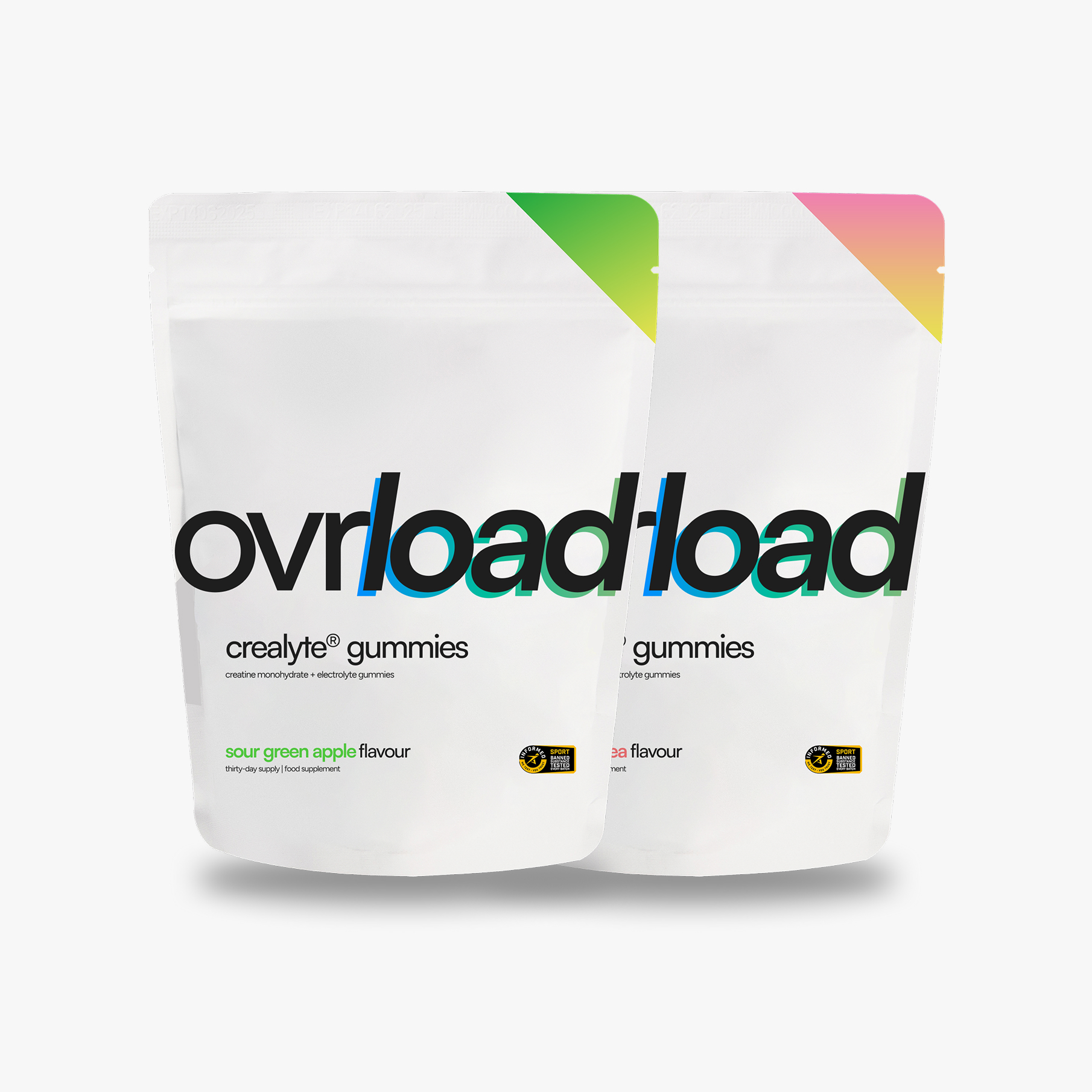 Two packs of ovrload gummies in sour green apple and tropical flavors.