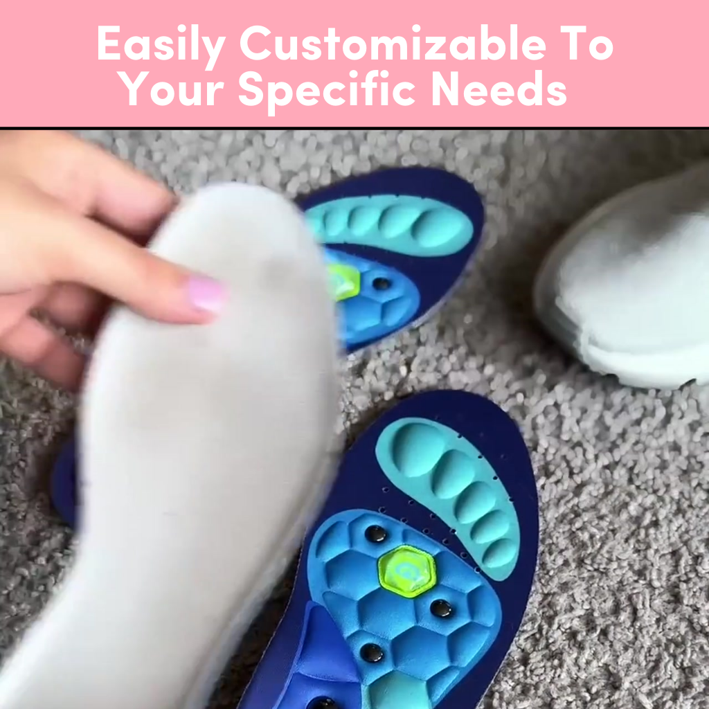 Hand holding a shoe insole above customizable insoles on carpet.