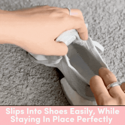 Hands holding a shoe with text about easy slipping and staying in place.