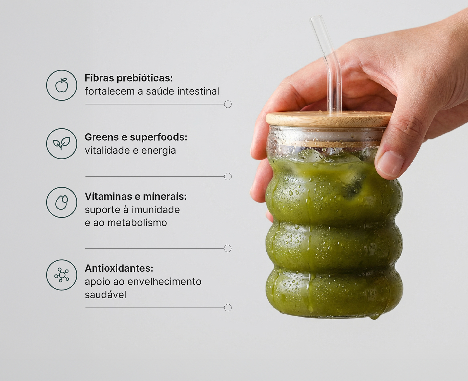 A hand holds a glass of green juice next to an infographic listing its health benefits.