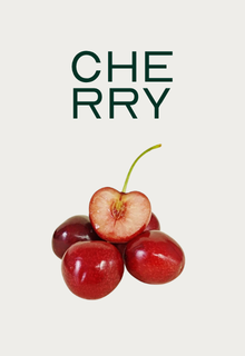 The word CHERRY is stacked above a small pile of fresh red cherries, one of which is sliced in half.