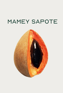 A mamey sapote fruit cut open, showing its orange flesh and a large, dark seed inside.