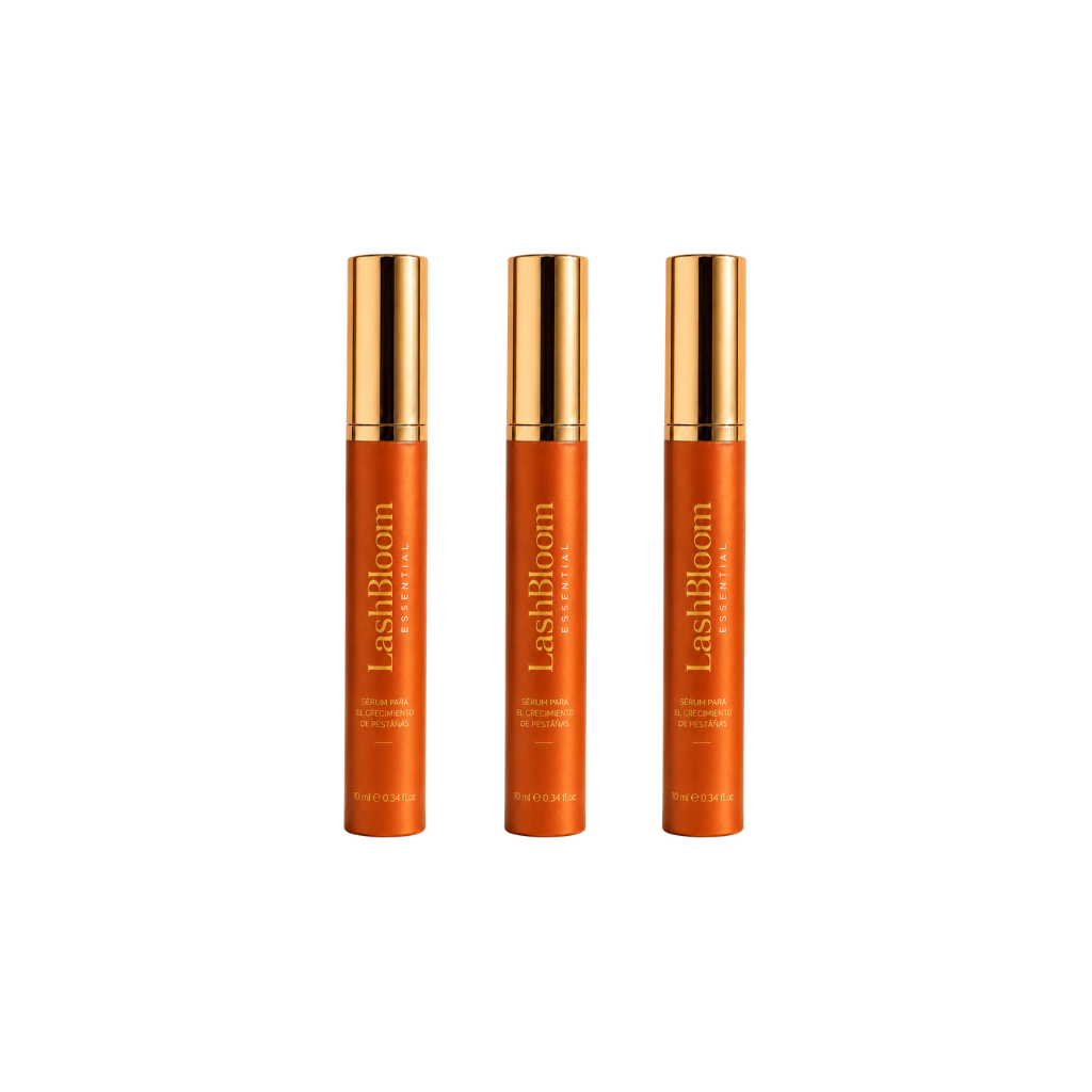 Three identical tubes of LashBloom Essential eyelash serum with orange bodies and gold caps on a white background.