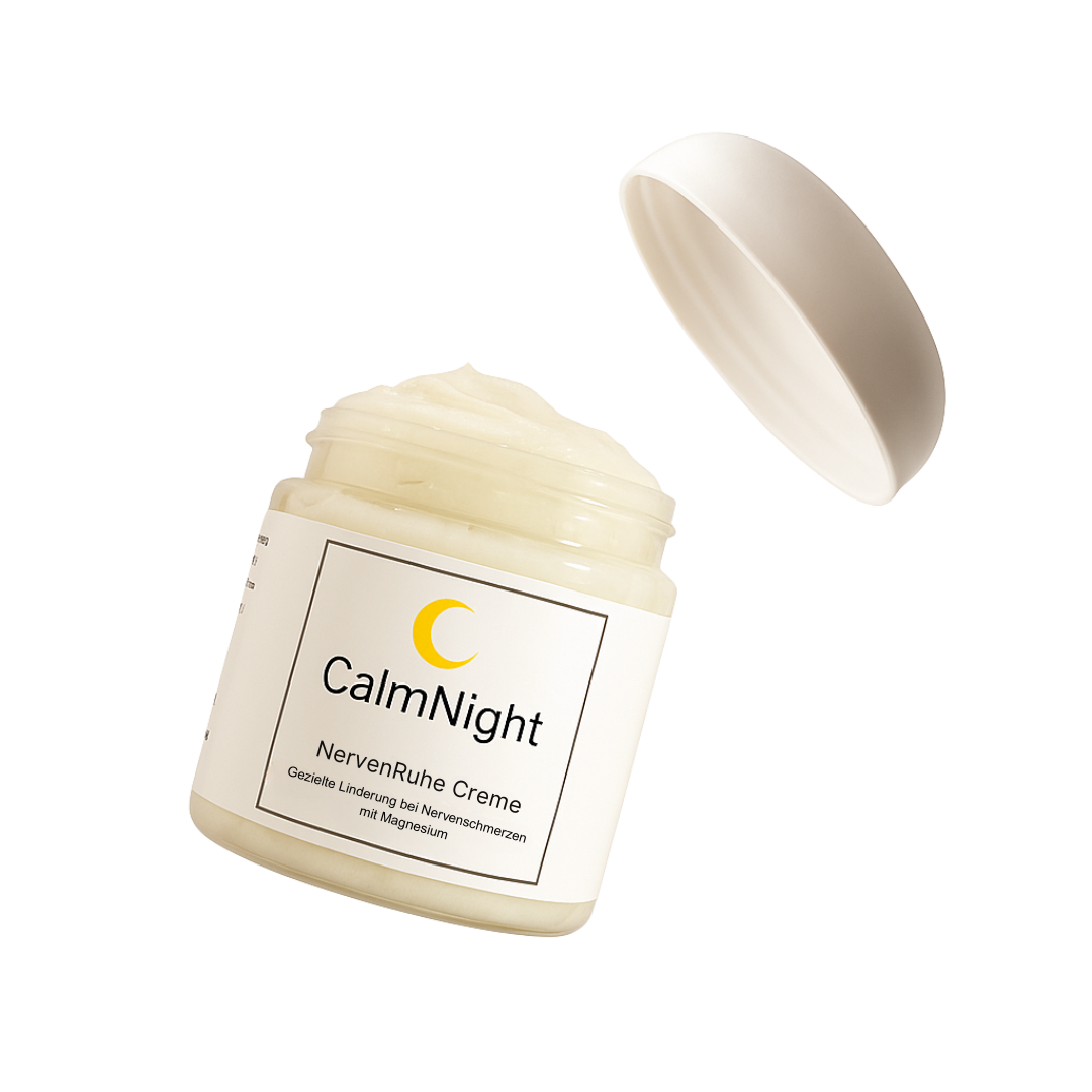 Open jar of CalmNight NervenRuhe Creme with lid floating above.