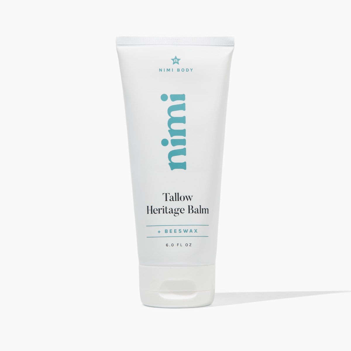 A white tube of Nimi Body Tallow Heritage Balm on a white background.