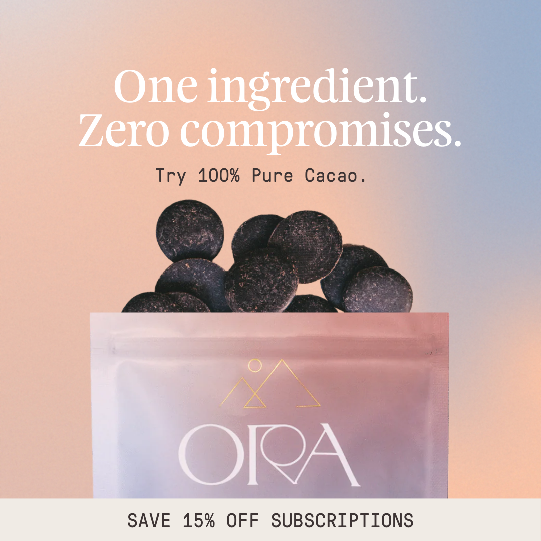 An advertisement for Ora 100% Pure Cacao, showing cacao discs and the product pouch.