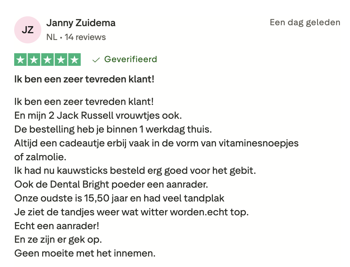 A screenshot of a 5-star customer review in Dutch from a user named Janny Zuidema.