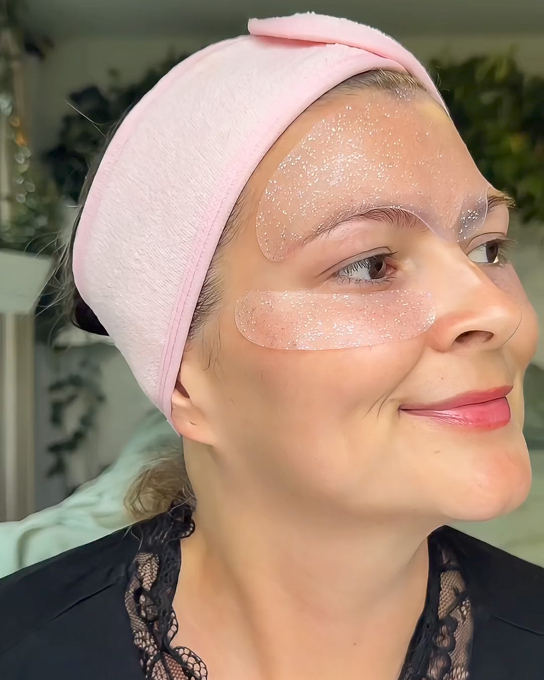 A woman wearing Busy Signal Eye & Smile patches and a Busy Signal Forehead patch