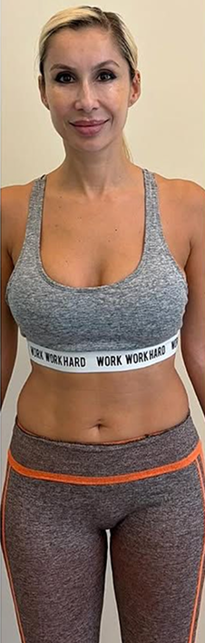 A person in athletic wear with 'Work Hard' text on the waistband.