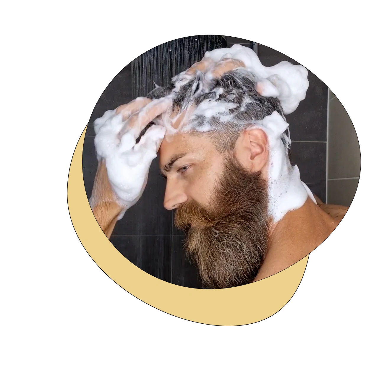 Man washing hair with shampoo in the shower.
