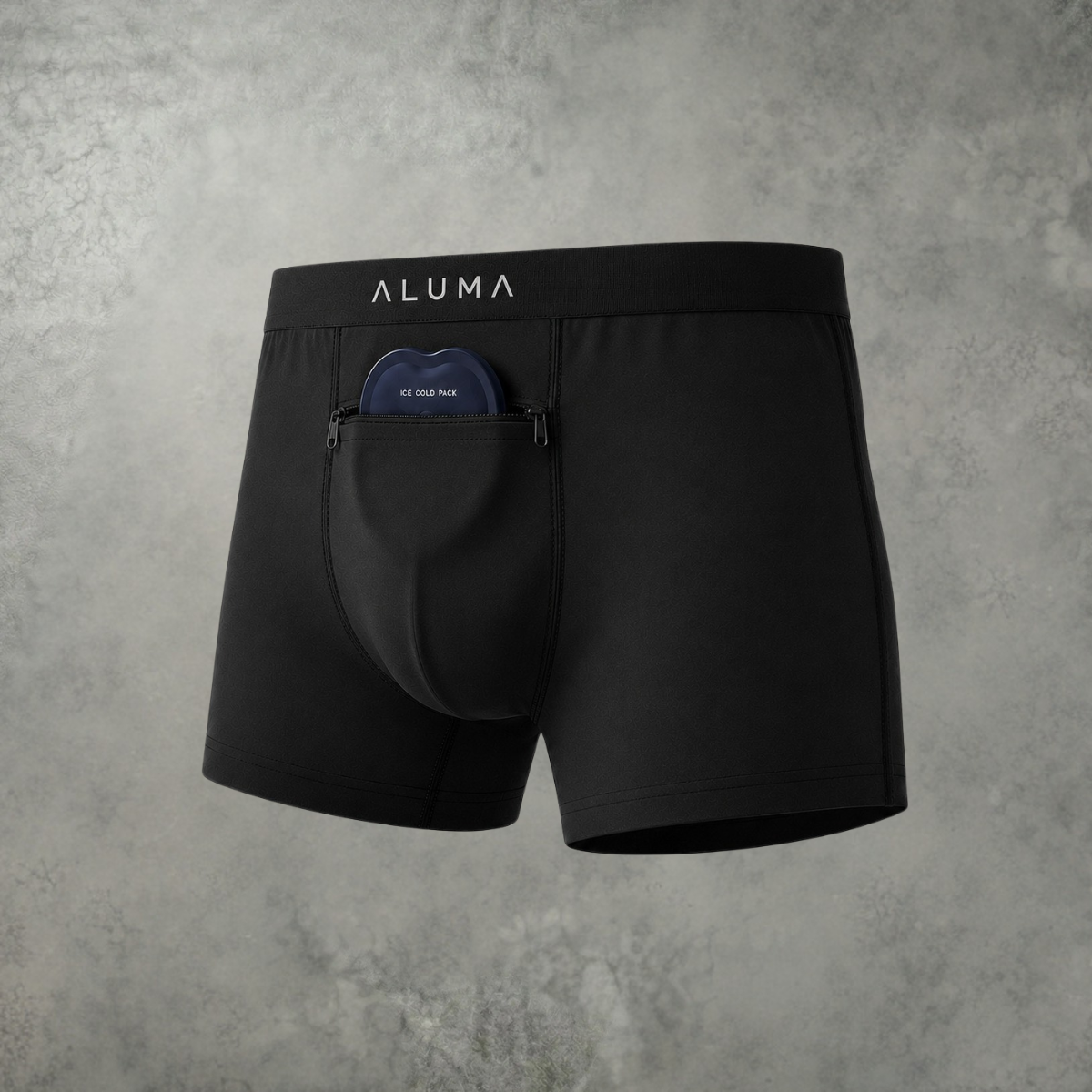 A pair of black Aluma boxer briefs with a small ice pack in a zippered front pocket.