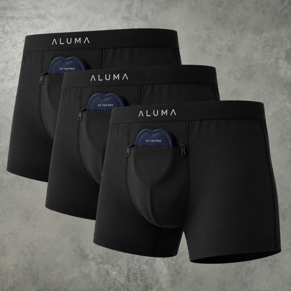 Three pairs of black Aluma boxer briefs, each holding an ice cold pack in a front zippered pocket.