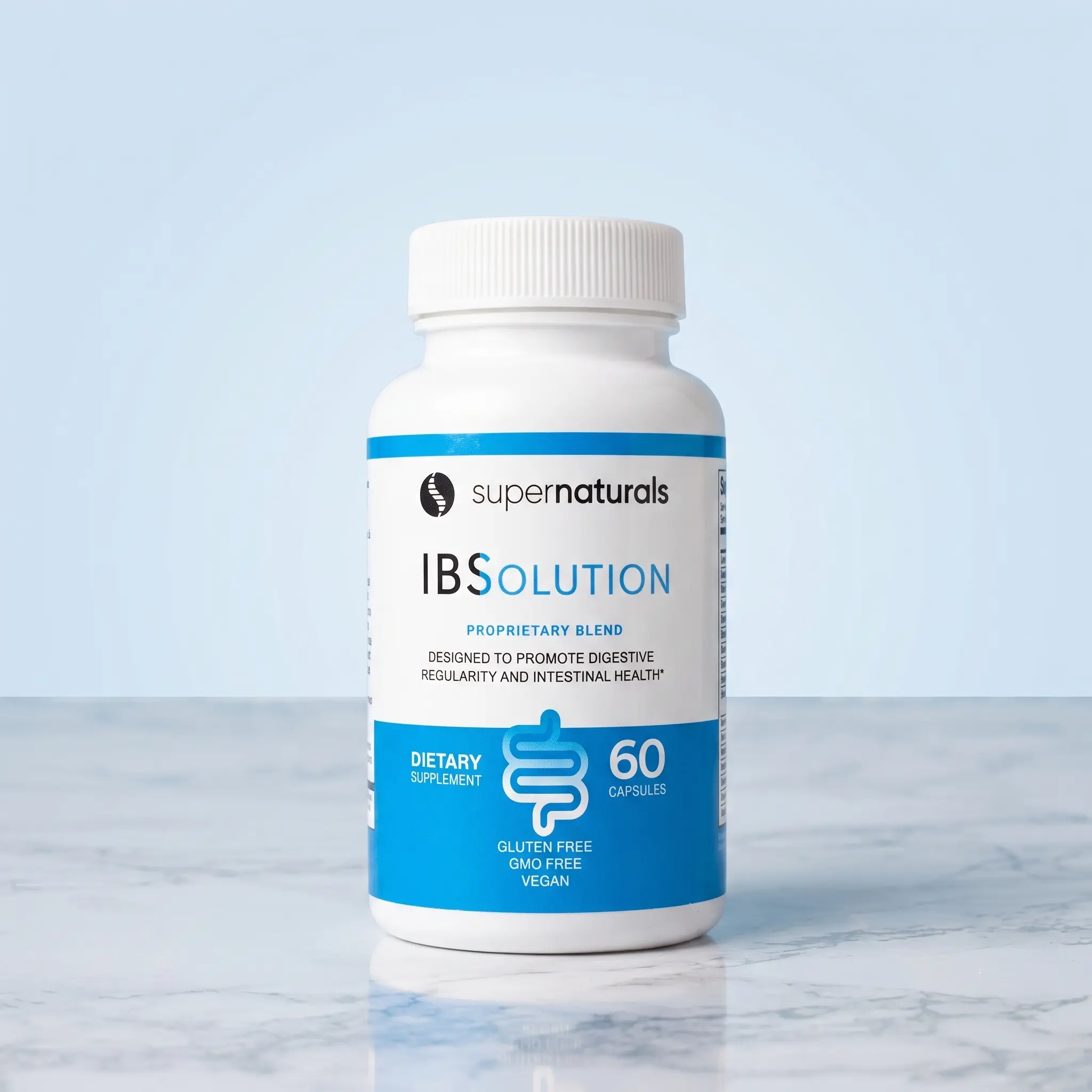 A bottle of Supernaturals IBSolution dietary supplement on a marble surface against a light blue background.