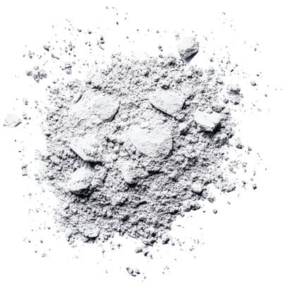 A pile of fine white powder on a white background.