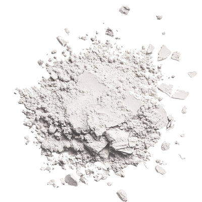 A pile of fine white powder on a white background.
