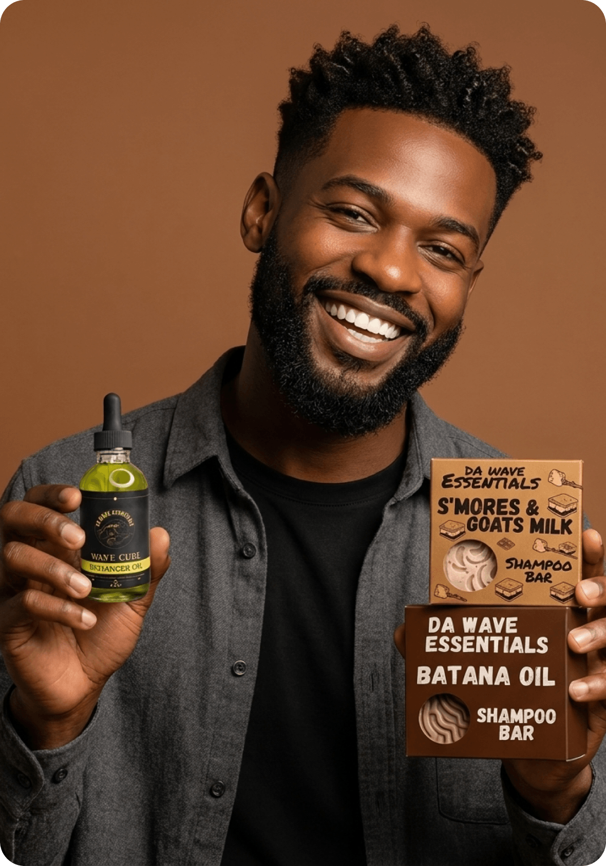 A smiling man with a beard holds up a bottle of hair oil and two shampoo bars.