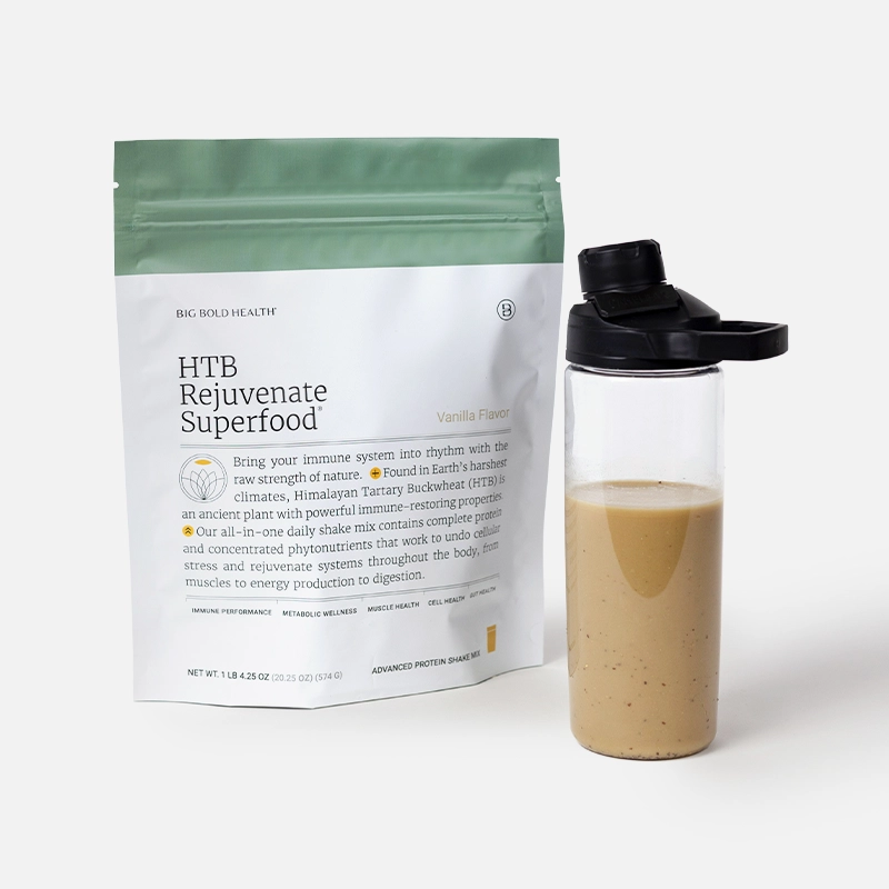 Packet of HTB Rejuvenate Superfood with a vanilla shake bottle nearby.