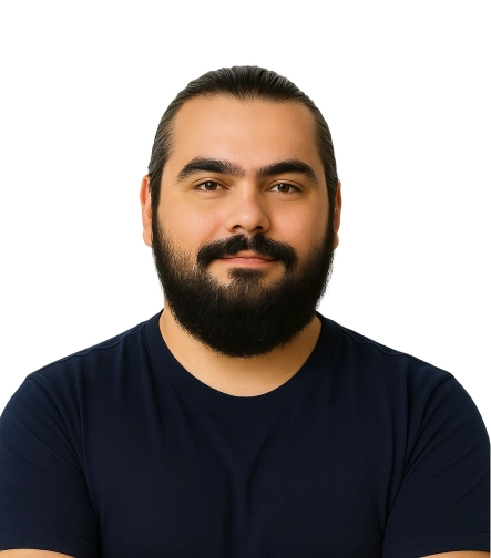 Bearded man in a black shirt on a white background.