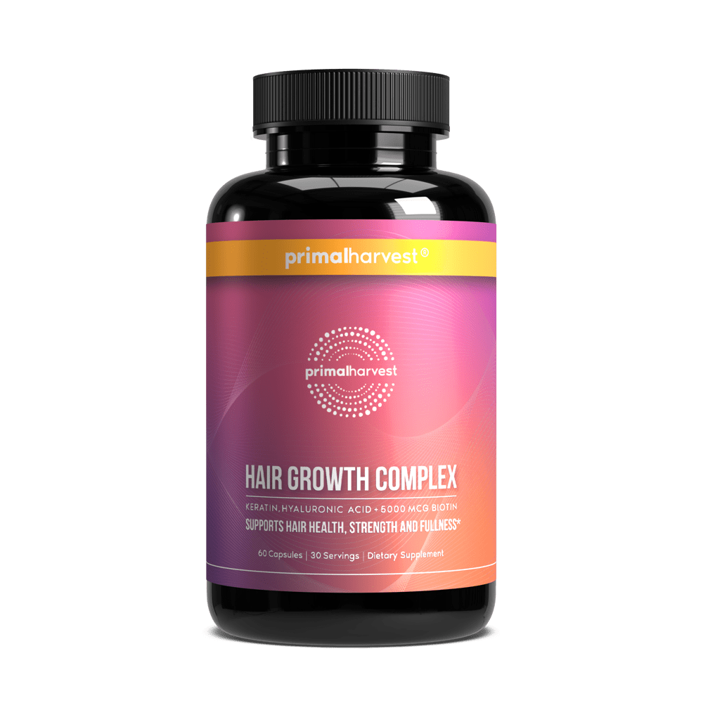 Black bottle of Primal Harvest Hair Growth Complex supplement.