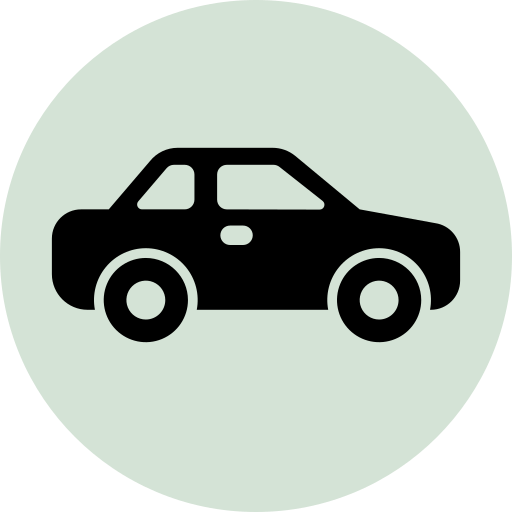 A black silhouette icon of a car inside a light green circle.