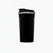Black travel mug with a closed lid on a white background.